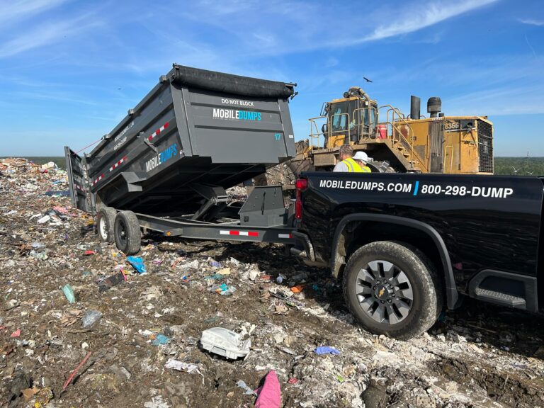 Mobiledumps Dumpster being dumped at landfill